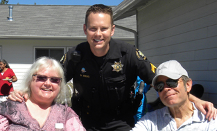 photo of Officer Riehs with community members