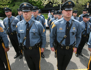 photo of police officers standing at attention