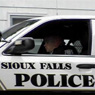 thumbnail of cop in a Sioux Falls vehicle