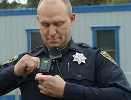 Officer attaching a body camera