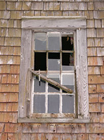 Broken Window from Foreclosed Property