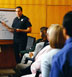 Police Officer speaking and instructing at a meeting