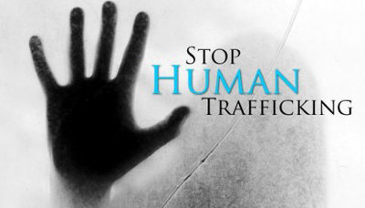 photo of a hand with the text stop human trafficking 