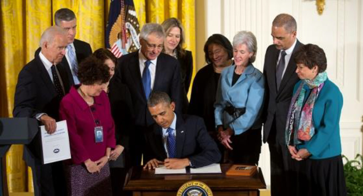 President Barack Obama signs the Presidential Memorandum establishing the White House Task Force to Protect Students from Sexual Assault on January 22, 2014