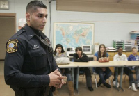 Police officer speaking in the classroom