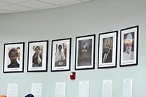 Portraits of the six Sikh worshippers killed in the shooting hang on the wall at the entrance of the Temple
