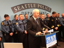 Official giving an address at Seattle Police Department