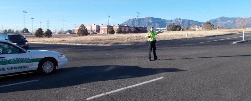 photo of colorado springs officer directing traffic