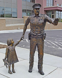 photo of statue representing the mission of the Sioux Falls Police Department