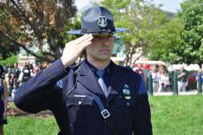 An officer saluting during the service